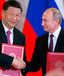 Xi Jinping and Vladimir Putin in Moscow in 2019 - Epoch Times 